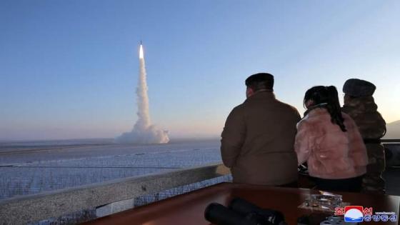 This undated picture released by North Korea's official Korean Central News Agency (KCNA) on December 19, 2023 shows North Korean leader Kim Jong Un (L) and his daughter watching the test launch of a Hwasongpho-18 intercontinental ballistic missile (ICBM) at an undisclosed location in North Korea. - North Korean leader Kim Jong Un personally oversaw this week's test launch of the country's most powerful solid-fuel intercontinental ballistic missile, which has the potential to reach the United States, state